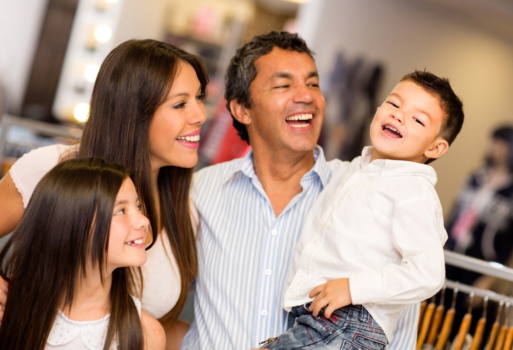 Shopping family looking very happy at a clothing store-1